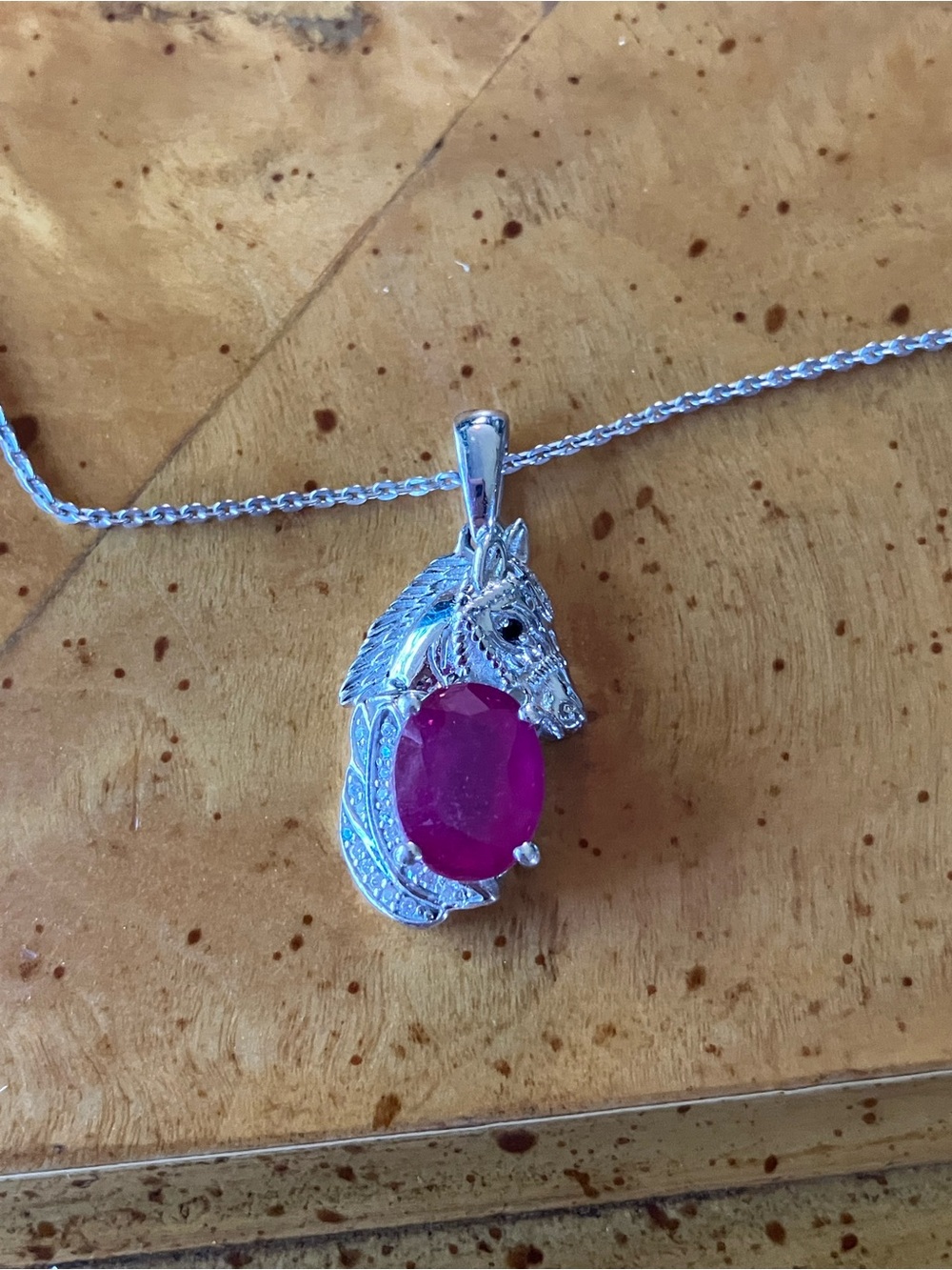 Niassa Ruby Sterling Silver Horse Necklace